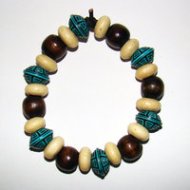 Bracelet Size Medium/Adult Female 4 in Made with Leather Cord, 18 Wood Beads and 6 Plastic Beads Price: $5.00