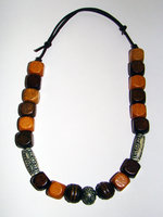Necklace Size Small/Adult 8.5 in to 10.5 in Made with Leather Cord, 18 Wood Beads and 3 Plastic Beads Price: $7.00